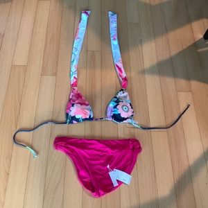 Trina Turk bikini size 14 bottoms NWT top is a large LNC